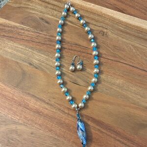 Elegant Blue and Gold Beaded Necklace with Pendant